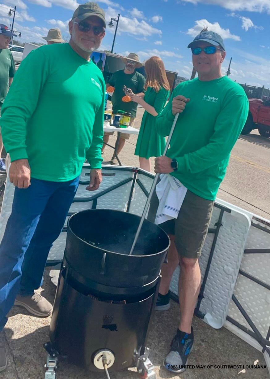 United Way of Southwest Louisiana's Board Chair, Gregory Thibodeaux of Turner Industries, prepares his team’s pastalaya for judging in the 2022 Battle for the Paddle, where he won the People’s Choice Award.