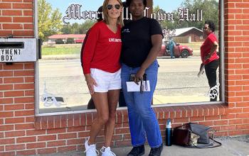 two women with envelope